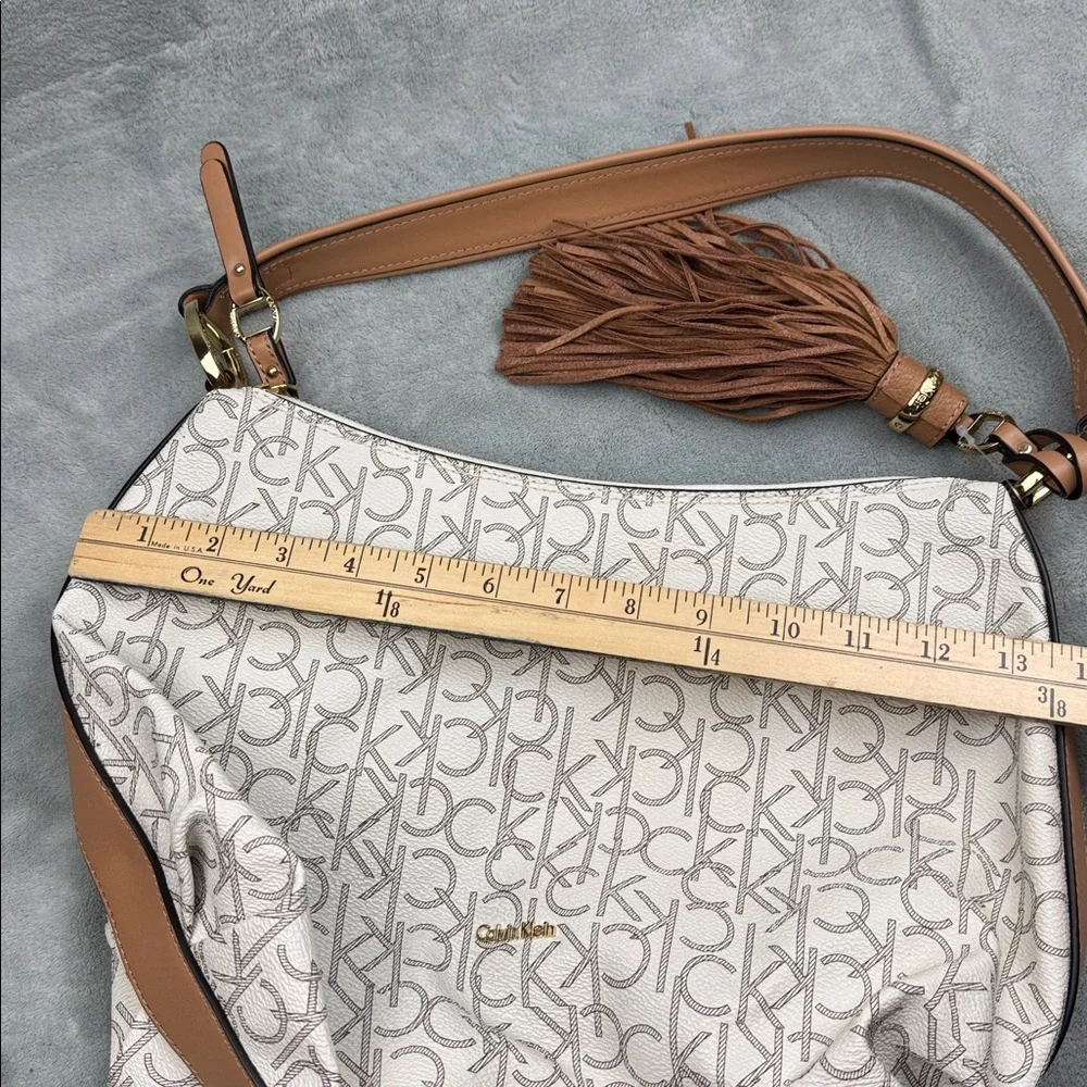 Calvin Klein Logo Print Hobo Bag in Cream and Brown